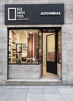 an empty store front with the door open