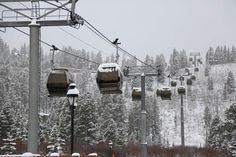 the ski lift is full of skiers and snow