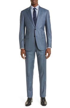 Textured virgin-wool sharkskin construction defines a modern, stylish suit framed with smart notched lapels. Jacket has notched lapels; four-button cuffs; chest welt pocket; front flap pockets; side vents Trousers have zip fly with hook-and-bar closure; front slant pockets; back button-welt pockets Jacket is lined; trousers are lined to the knee 100% virgin wool Dry clean Imported 3 Piece Suit Men, Summer Suits Men, Sharkskin Suit, Light Blue Suit, Western Suits, Italian Suit, Tie Men, Stylish Suit, Pocket Jacket