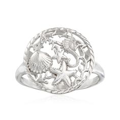 a silver ring with sea shells and starfishs on it