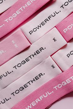 several pink labels with words on them that read together, together and powerful