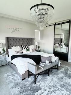 Master bedroom rug, furniture, bed, crystal chandelier nightstand bedroom bench lamps barn door metal sliding door Modern Farmhouse Glam Bedroom, Guest Bedroom Ideas Cozy Modern Elegant, Modern Farmhouse Glam Master Bedrooms, Beautiful Bedrooms Master Luxury Modern, Farmhouse Glam Decor Bedroom, Glamour Farmhouse Decor, Farmhouse Glam Bedroom Ideas, Modern Bedroom Women, Industrial Glam Bedroom Ideas