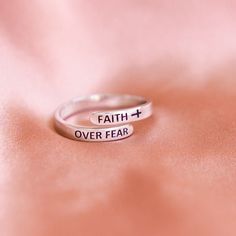 "I sought the Lord, and He answered me; He delivered me from all my fears." - Psalm 34:4 Too often, we become weighed down by fear, anxiety, and stress. In the midst of trials, it can be easy to forget that our faith makes us whole, providing peace and deliverance. Wear this ring through the good times and the bad, choosing faith over fear even when it's hard. *90 Day Happiness Guarantee  🌟 Certified 925 Sterling Silver & Rhodium Plated.  🙌🏼 One size Fits All - adjust to any finger.  🎁 Makes Psalm 34 4, Mountain Wear, Faith Moves Mountains, Best Gifts For Girls, Psalm 34, Christian Pictures, Faith Over Fear, Cross Ring, Christian Jewelry