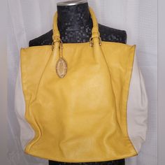 Elie Tahari Women's Leather Handbag. Yellow And Cream Color, 100% Leather, Braided Handles, And A Few Small Interior Pockets. Like New Dustbag Included. Luxury Yellow Shopping Bag, Designer Yellow Satchel With Double Handle, Luxury Yellow Tote Bag, Designer Yellow Satchel With Removable Pouch, Designer Yellow Satchel With Detachable Strap, Designer Yellow Satchel With Handles, Luxury Yellow Satchel Shoulder Bag, Designer Yellow Leather Bags, Luxury Yellow Shoulder Bag For Shopping