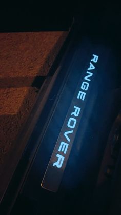 the name range rover is illuminated in blue light