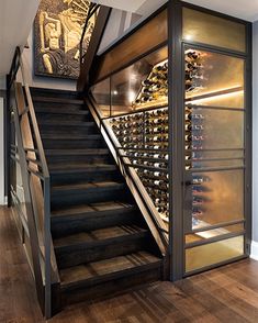 a wine cellar with stairs leading up to it