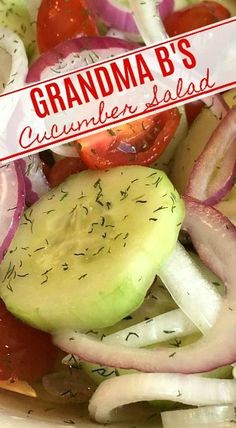 a salad with onions, cucumber and tomatoes in it is displayed on a plate