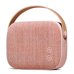 an image of a pink speaker with wooden handles on the front and side, against a white background