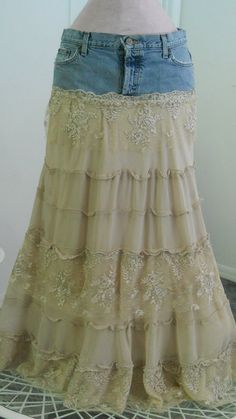 a woman's skirt with lace on the bottom and ruffles around it