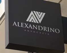 the sign for alexandriano advocacia hangs from the side of a building