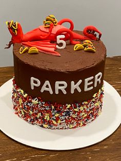 there is a cake that says parker on it