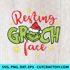 the grin face is wearing a santa hat and holding a green leaf with red lettering reading resting