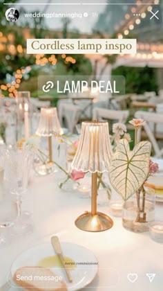 an image of a table setting with candles and flowers