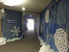 the hallway is decorated with snowflakes and decorations