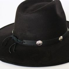 This 1/2 inch thick leather hatband is decorated with oval metal conchos. It is adjustable with a leather string tie.Made in the USASoft Genuine Leather*This product is for 1 single hat band. Hat not included. 100% Leather Austin Accent Hat Band Black Leather Silver Conchos Adjustable Adjustable Country Hat Bands For Fall, Adjustable Hat Bands For Country Events In Fall, Adjustable Fedora For Country Events, Adjustable Fall Fedora For Rodeo, Adjustable Fedora For Fall Rodeo, Adjustable Fedora For Rodeo In Fall, Country Style Adjustable Fedora With Flat Crown, Classic Adjustable Hat Bands For Western-themed Events, Adjustable Black Hat Band For Rodeo