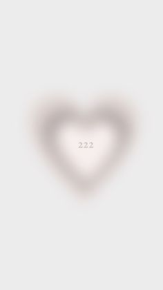 a white heart shaped object with the number 22 on it's left hand side