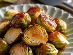 brussel sprouts on a plate with sauce