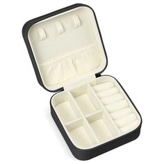 an open black and white case with compartments