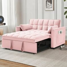 a living room with a pink couch and white rug