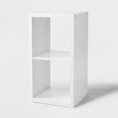 a white shelf sitting on top of a white floor