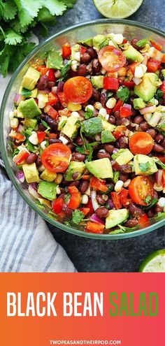 black bean salad with tomatoes, avocado and cilantro in a glass bowl