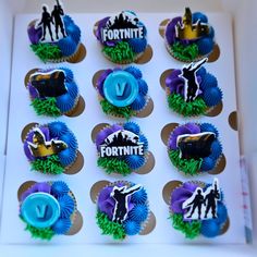 twelve decorated cupcakes in the shape of fortnite