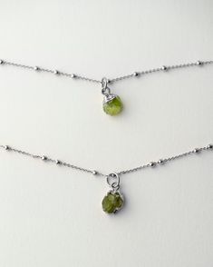 August's birthstone necklace features the Peridot, a symbol of rebirth and renewal. Its bright and refreshing lime green color is not just visually stunning, but is said to aid in harmonizing the mind and body, promoting peace, inspiring creativity and even improve mood. Adding this Peridot necklace to your collection is a perfect way to carry a positive energy with you wherever you go. Wear as many birthstone pendants as you want to represent the important individuals in your life. Discover our August Birthstone Necklace, Jewelry Box Design, Boost Creativity, Peridot Necklace, Flat Shapes, Improve Mood, Birthstone Pendant, August Birth Stone, Custom Jewelry Design