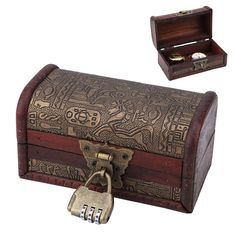 an ornate wooden box with a lock and key