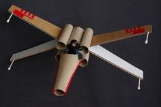 an airplane made out of toilet paper and cardboard