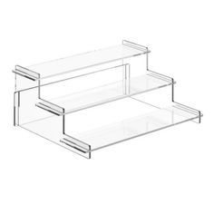 three clear shelves with drawers on each side