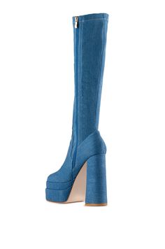 **FINAL SALE - NO EXCHANGES OR RETURNS** Show up and stand out with this statement shoe! The Maxine Denim Platform Boot is a sexy, stretchy knee-high boot featuring an ultra chunky heel, a platform base, a squared toe, a curve-hugging denim base, and a tonal inner ankle zipper closure. Perfect for a night out with your besties! Fit and details (approx. measured from a women’s size 7.5) 5.5” heel height 2.5” platform 15.5” shaft height Chunky heel Slightly squared toe Inner ankle zipper Denim Boots, Statement Shoe, Platform Boots, Show Up, Chunky Heel, Chunky Heels, Knee High Boots, Knee High, Final Sale