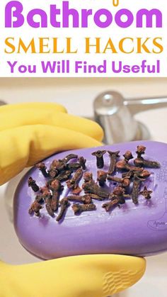 there is a purple bath brush with some brown things on it and the words, bathroom smell smells smell you will find usefully