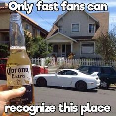 someone is holding up a bottle of corona beer in front of their house with the caption, only fast fans can recognize this place