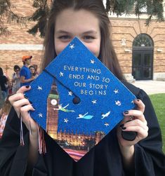 a girl in graduation gown holding up her cap with the words everything ends and so our story begins