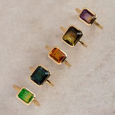 A sparkly statement piece that will have everyone looking east-west! Show off your shining style with this bold and beautiful bezel-set ring, perfect for adding a touch of glimmer to your day.  For You, With Love is a Local Eclectic exclusive.  Yellow green and golden purple: Quartz 9 x 7 mm Golden yellow: Glass stone 9 x 7 mm Gold plated  Brass base Band width 1.6 mm Bezel Setting Ring, Yellow Gemstone Ring, Peridot Engagement Ring, Peridot Engagement Rings, Printable Ring Sizer, Soul Stone, Unique Fashion Jewelry, Local Eclectic, Precious Rings