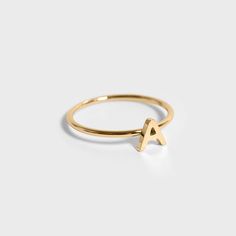 Personalize your look with our minimalist gold initial letter stacking ring! The perfect golden accent you can add to your everyday style, this ring can be worn alone or stacked with others to create something meaningful to you. Wear your initials, the initials of loved ones, or stack multiple letters together - the choice is yours! You'll never want to take this adorable stacking ring off, and you won't have to! Wear it in the shower, while you sweat, in the pool, or ocean - it will never turn Small Letter, Letter Ring, Small Letters, 18k Gold Jewelry, Gold Initial, In The Pool, Initial Letter, Initial Letters, Stacking Ring