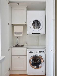 a washer and dryer in a small kitchen