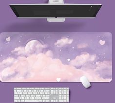 a computer keyboard and mouse on a desk with a purple background that has hearts floating in the sky