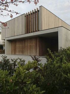 the house is made out of concrete and wood