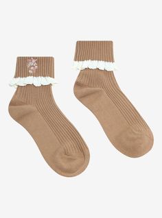 We love a cute neutral palette! These ribbed  taupe ankle socks have fold-over cuffs and feature dainty flowers embroidered on the sides. Comes with cream lace trimming.One size fits most75% cotton; 10% polyester; 10% nylon; 5% spandexWash cold; dry lowImported Cute Lace Trim Socks For Spring, Cute Cream Socks For Spring, Cute Cream Spring Socks, Frill Socks, Lace Ankle Socks, Brown Socks, White Runners, Flowers Embroidered, Dainty Flowers