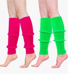 two pairs of legs with green and pink leg warmers on top of each other