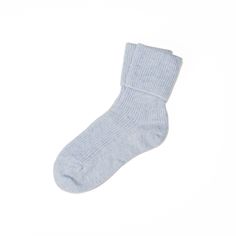 Our pure cashmere socks are perfect for keeping your feet warm and cosy. Available as one size fitting UK 4-7 feet and in a selection of colours. Knitted in Hawick in the Scottish Borders, their composition is 100% super soft cashmere, using a thick cashmere yarn, resulting in a looser fit that is ideal for keeping cosy in bed. The socks will be sent in an Ava Innes gift box. We offer a personalisation service and can add a name to the band as per the photo. Simply add the person's name as well as a gift message, if you'd like, to the 'Order Notes' section at checkout. If no name is requested we will include our "Made especially for you" band. Casual Cashmere Winter Socks, Comfortable Knitted Cream Socks, Cashmere Bed Socks, Cashmere Navy Socks, Woman Bedding, Luxury Gift Set, Bed Socks, Cashmere Socks, Cashmere Throw