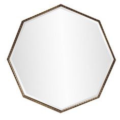 an octagonal shaped mirror with wood trim around the edges and a metal frame, on a white background