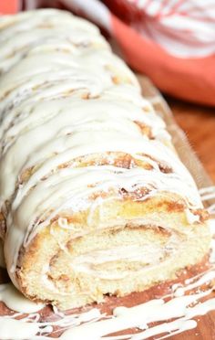 a loaf of cinnamon roll covered in icing