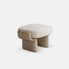 the foot stool is made out of wood and fabric