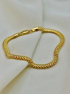 18k Gold Bismarck Bracelet, 4mm, 7.5", 4.710 gr . 18K solid gold bismark or Mesh chain bracelet is the best choice , because it is comfortable and flexible to use and easily adapts to every style.  Priced to sell! Compare our prices to other similar sellers! Arrives in a GIFT BOX and includes FREE SHIPPING within the USA and Canada. International shipping is available at the most economical rates on ETSY. I HAVE BEEN IN THE JEWELRY BUSINESS ALL MY LIFE. I am a second -generation family member ma Gold Flexible Snake Chain Bracelet, Gold Jubilee Bracelet With Snake Chain For Formal Occasions, Formal Gold Snake Chain Jubilee Bracelet, Formal Gold Jubilee Bracelet With Snake Chain, Gold Plated Flexible Chain Bracelet, Yellow Gold Jubilee Bracelet With Snake Chain, Fast Replies, Bracelet Elegant, Gold Armband