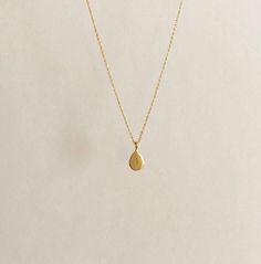 FREE SHIPPING, 14k yellow solid gold drop necklace. It can be produce 14k rose gold and white gold. DETAILS Chain is shown length approx. 40 cm (16 inch) and thickness is 1mm (0.04 inch). Pendant height is 0.6 cm (0.23 inch). Chain can be lengthened for choosing option. The chain has a spring ring clasp. You may order a shorter or longer chain by leaving a note during checkout. MATERIALS All our jewelry are made of 14 karats solid gold. We like to use yellow gold, white gold and rose gold to ple Dainty Yellow Gold Teardrop Jewelry, Dainty Teardrop Yellow Gold Jewelry, Minimalist 14k Gold Teardrop Pendant Jewelry, Minimalist 14k Gold Teardrop Jewelry, Minimalist Yellow Gold Teardrop Pendant Jewelry, Dainty Polished Recycled Gold Necklace, Dainty Recycled Gold Necklace With Polished Finish, Dainty Necklace In Polished Recycled Gold, Minimalist Yellow Gold Briolette Jewelry