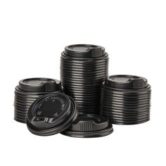 several black plastic cups stacked on top of each other with the lids closed and one empty