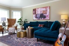 a living room filled with furniture and decor