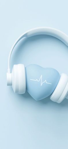 a blue and white headphone with a heart on it's earbands